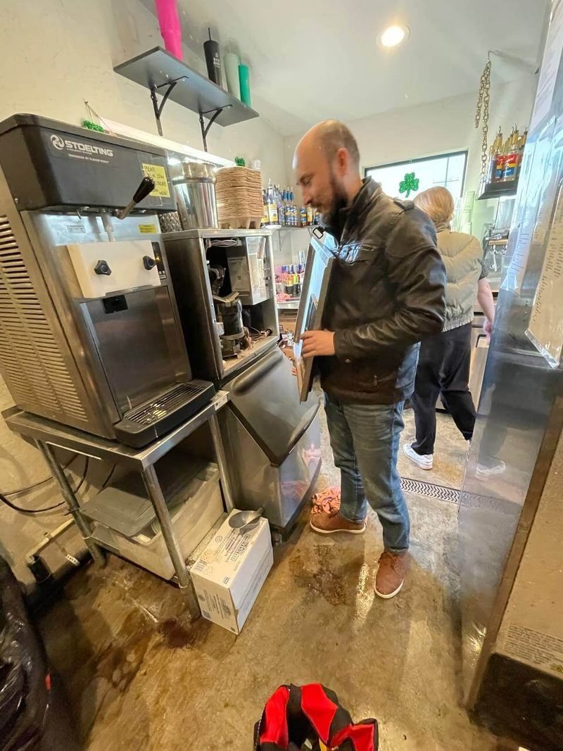 Our technician checking a commercial kitchen refrigerator
