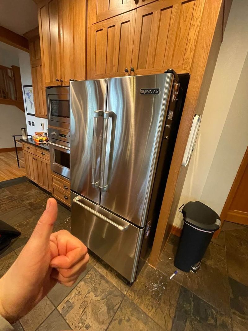 Stainless French-door refrigerator after a repair